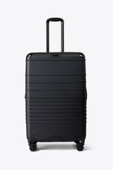 The Hybrid Check-In Roller in Black